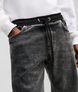 MIXED-MATERIAL TAPERED JEANS