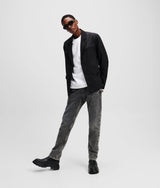 MIXED-MATERIAL TAPERED JEANS