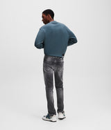 DISTRESSED SLIM JEANS